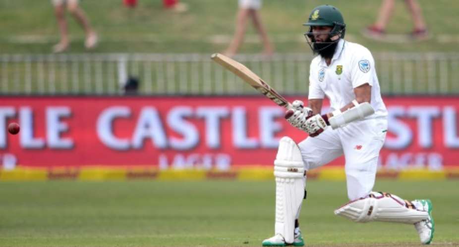 South Africa's Hashim Amla bats in the first Test against New Zealand at the Sahara Cricket stadium in Durban on August 19, 2016.  By Gianluigi Guercia AFP