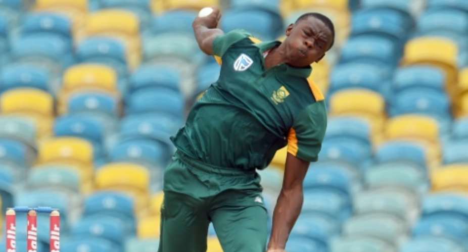 South African bowler Kagiso Rabada delivers a ball during the 9th One Day International match of the Tri-nation Series between South Africa and West Indies at the Kensington Oval stadium in Bridgetown on June 24, 2016.  By Jewel Samad AFPFile