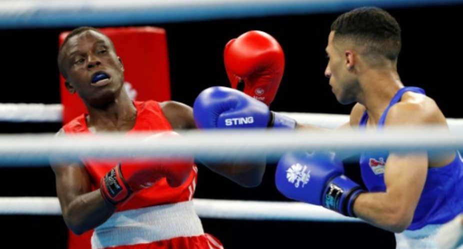 Boxer Simplice Fotsala red is one of eight athletes from Cameroon to go missing during the Commonwealth Games in Australia.  By ADRIAN DENNIS AFP