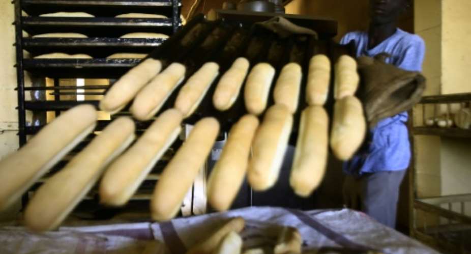 Bread prices in Sudan have more than doubled after a jump in the cost of flour due to dwindling wheat supplies.  By ASHRAF SHAZLY AFP