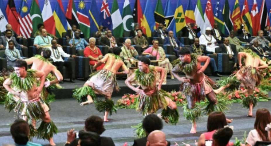 Britains King Charles III watches as dancers perform during the opening ceremony for the Commonwealth Heads of Government Meeting (CHOGM) in Apia, Samoa.  By WILLIAM WEST (POOL/AFP)