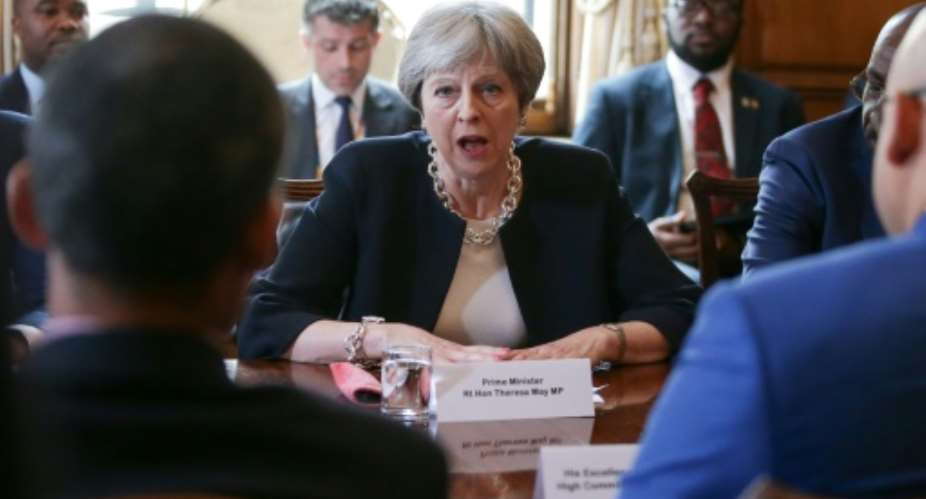 Britain's Prime Minister Theresa May hosts a meeting with leaders and representatives of Caribbean countries, at 10 Downing Street in central London, on April 17, 2017, on the sidelines of the Commonwealth Heads of Government meeting CHOGM.  By Daniel LEAL-OLIVAS POOLAFP