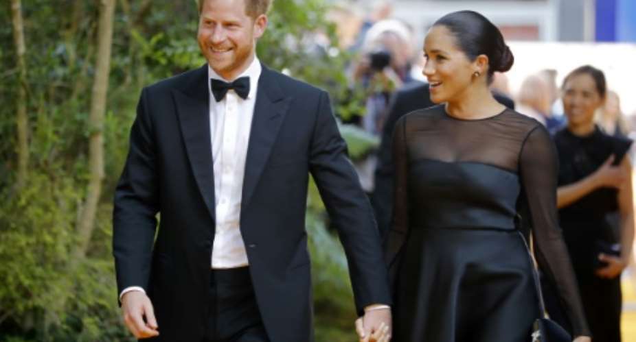 Britain's Prince Harry and his wife Meghan will be on their first official tour as a family.  By Tolga AKMEN AFPFile
