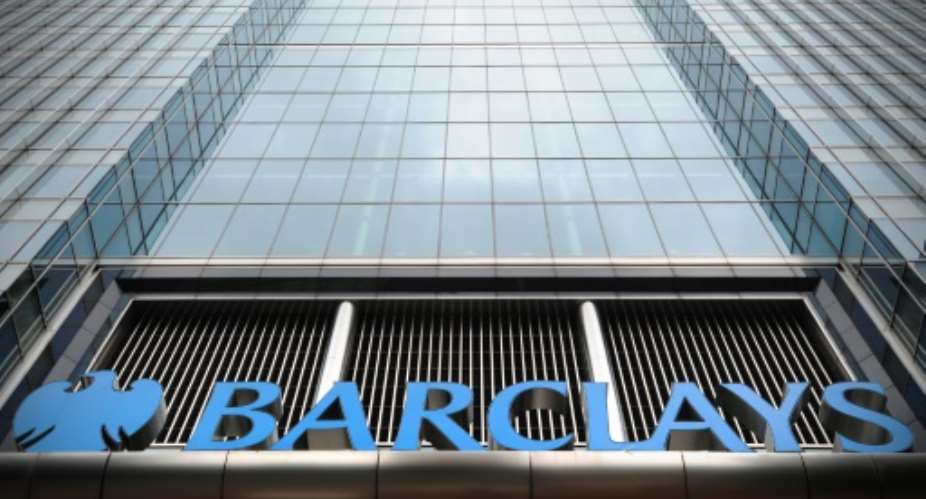 British bank Barclays reports profits after taxation diving but group pre-tax profit more than doubling in the first quarter.  By Carl COURT AFPFile