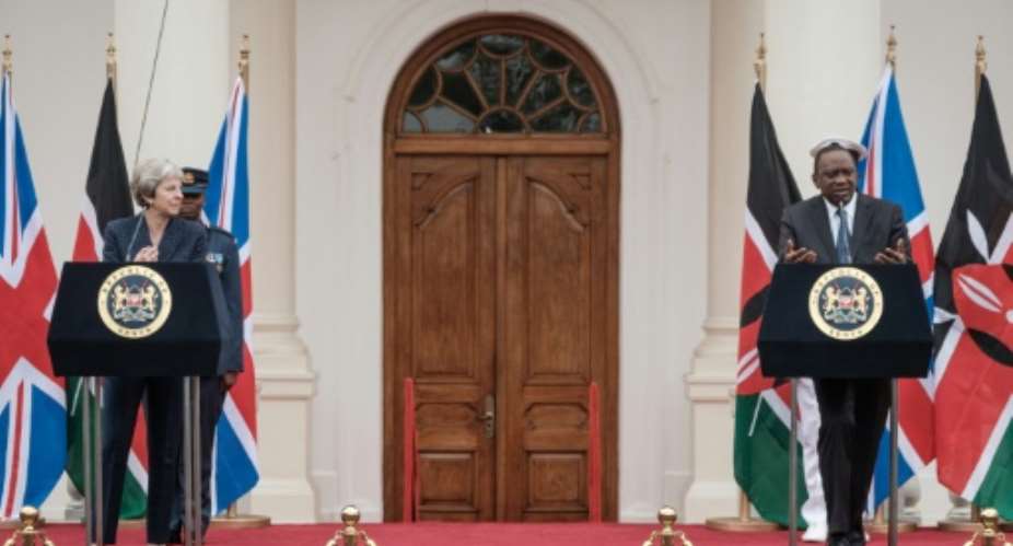 British Prime Minister Theresa May and Kenyan President Uhuru Kenyatta address a joint press conference in Nairobi.  By Yasuyoshi CHIBA AFP