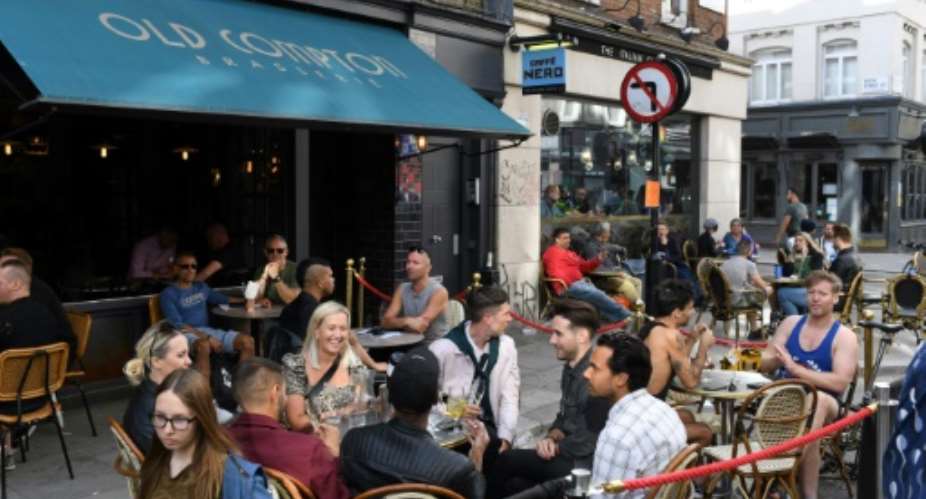 British pubs may be forced to close earlier.  By DANIEL LEAL-OLIVAS AFPFile