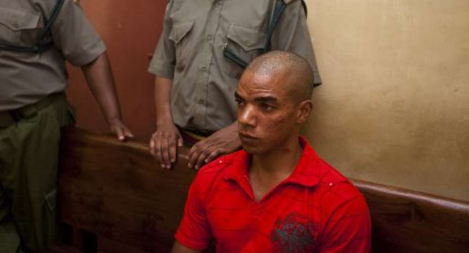 Briton Jermaine Grant appears in the Shanzu Law Court in the city of Mombasa on February 17, 2014.  By Ivan Lieman AFPFile