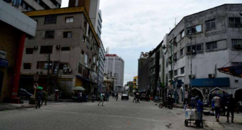 Broad Street, the home of some of Nigeria's biggest corporations, has become almost deserted.  By PIUS UTOMI EKPEI AFP