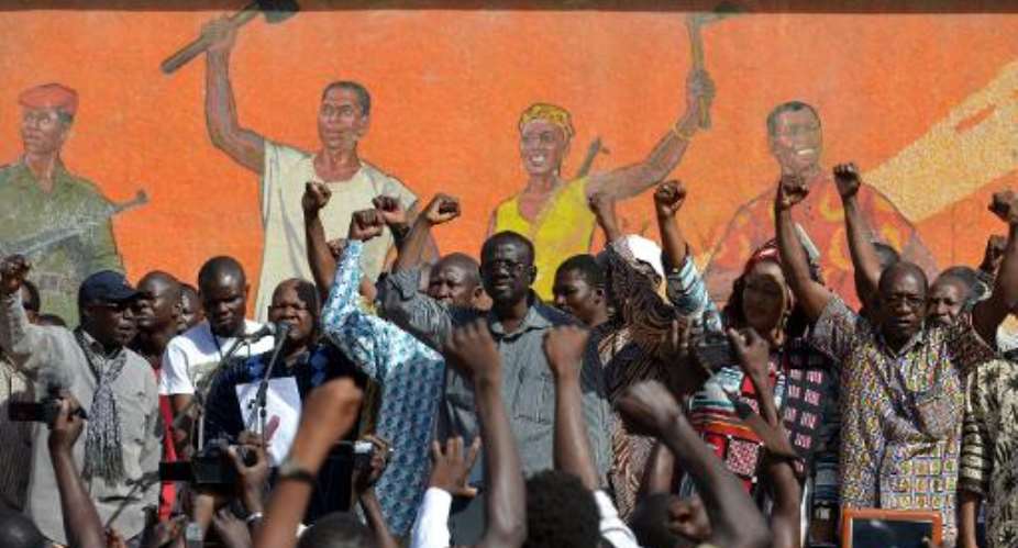 Opposition leaders gather during a protest at the Place de la Nation in Burkina Faso's capital Ouagadougou on November 2, 2014,  calling for the departure of the military.  By Issouf Sanogo AFP
