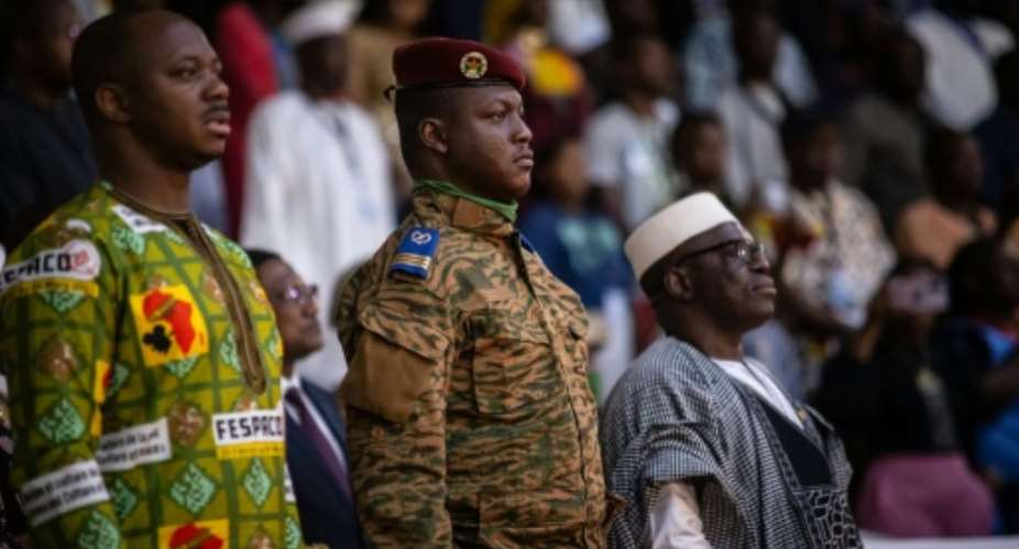 Burkina Faso military leader Captain Ibrahim Traore (C) says he is leading a popular progressive revolution.  By OLYMPIA DE MAISMONT (AFP/File)