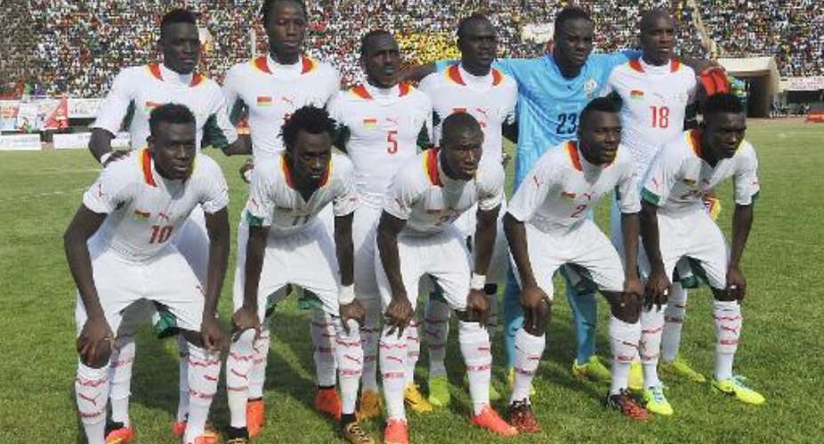 Burkina Fasos national football team players pose prior to their 2015 African Cup of Nations qualifying football match against Lesotho on September 6, 2014 in Ouagadougou.  By Ouoba-Ahmed (AFP/File)