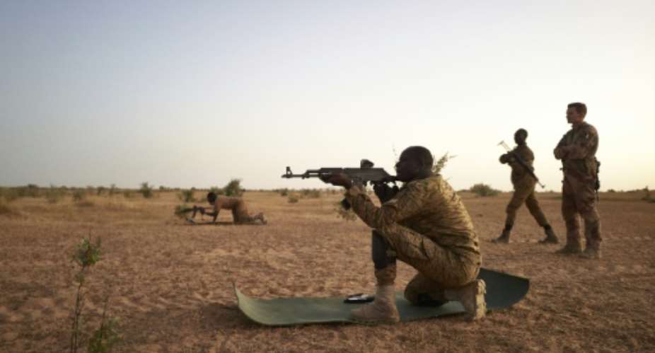 Burkina Faso's armed forces are struggling to contain a jihadist insurgency that has claimed some 1,500 lives.  By MICHELE CATTANI AFPFile