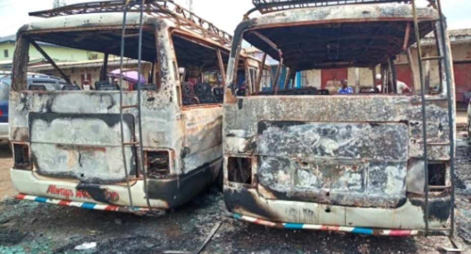 Burned-out buses in Buea, the capital of Cameroon's Southwest Region. The two-year conflict between anglophone separatists and security forces has claimed more than 3,000 lives.  By - AFP
