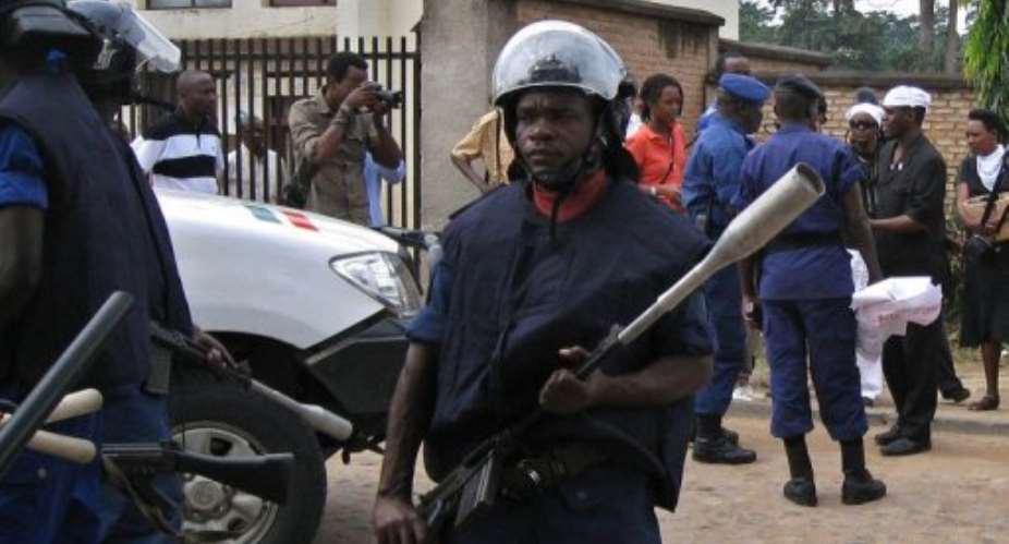 A Burundian activist is arrested by police in Bujumbura.  By Esdras Ndikumana (AFP/File)