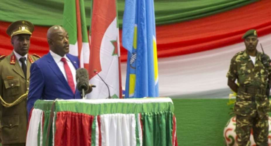 Burundi's President Pierre Nkurunziza gives a speech after being sworn in for a controversial third term in power, at the Congress Palace in Kigobe district, Bujumbura on August 20, 2015.  By Griff Tapper AFPFile