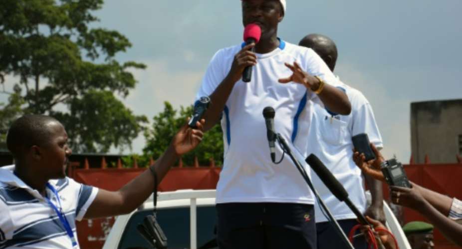 Burundi's Vice President Gaston Sindimwo delivers a speech on December 26, 2015 during a demonstration against the Republican Forces of Burundi Forebu on the shores of Lake Tanganyika near the capital Bujumbura.  By Onesphore Nibigira AFPFile