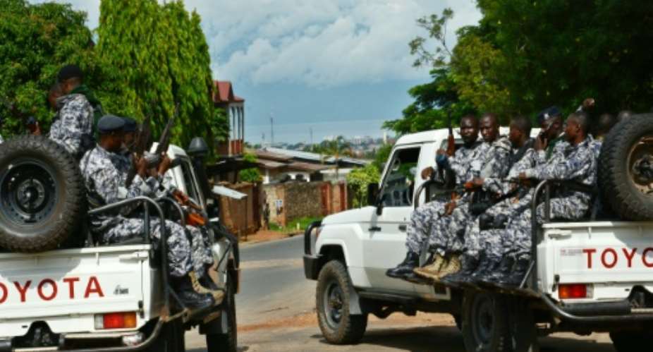 Burundian security forces patrol the streets of Bujumbura in April 2016.  By Onesphore Nibigira AFPFile