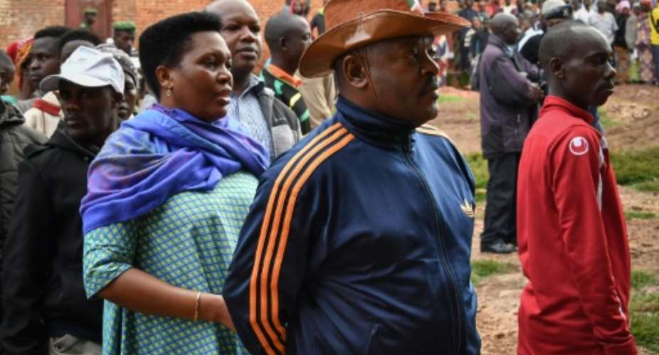 Burundi's incumbent president since 2005, Pierre Nkurunziza, queues  up to cast his vote for the referendum on a controversial constitutional reform that would allow him to remain for another 16 years in power.  By STR AFPFile