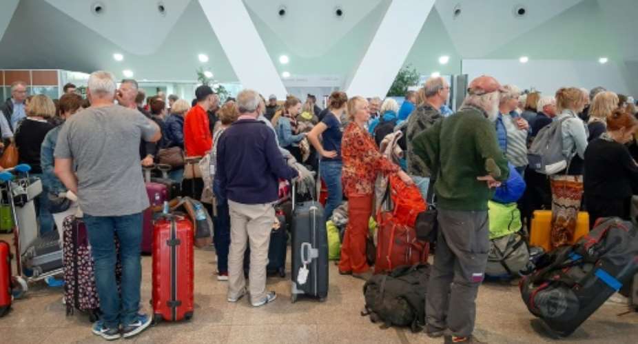 Busier times: this file photo from March 15, 2020 shows passengers awaiting their flights at Marrakesh Airport.  By - AFPFile