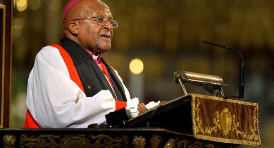 South African Archbishop Desmond Tutu speaks at Westminster Abbey in London on March 3, 2014.  By John Stillwell POOLAFPFile