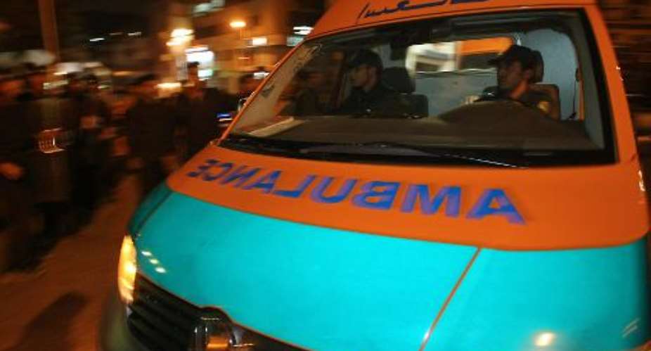 File picture shows an ambulance responding to an emergency in Cairo where one person was killed in a bomb explosion outside a pizzeria Thursday, after three other blasts hit offices of cell phone companies.  By Cris Bouroncle AFPFile