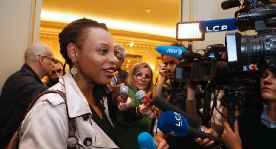 Cameroonian author Leonora Miano talks to journalists on November 6, 2013 in Paris, after being awarded by the Femina literary prize for her novel La saison de l'ombre.  By Thomas Samson AFP