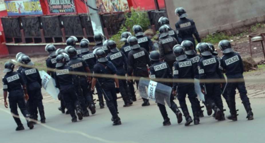 Cameroon police wearing riot gear have previously been deployed on the streets of the country's English-speaking region after violence broke out.  By STR AFPFile
