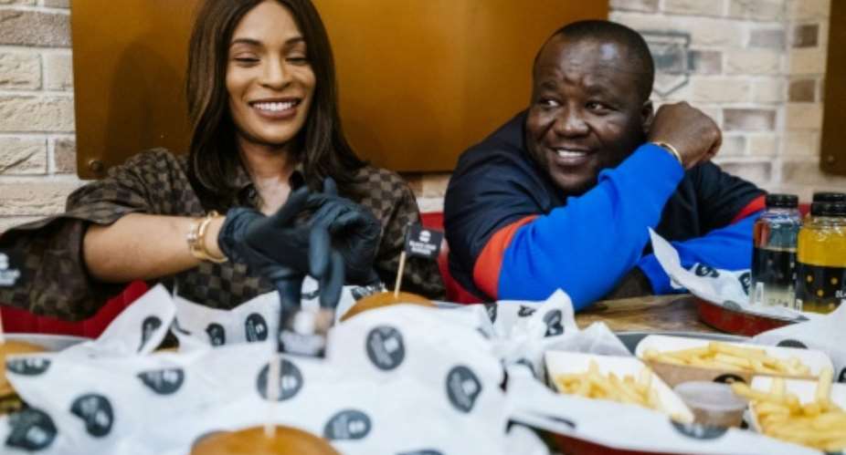Cameroonian entrepreneur couple Walter and Cindy Tchassem are at the centre of a music and restaurant business empire in Russia.  By Dimitar DILKOFF AFP