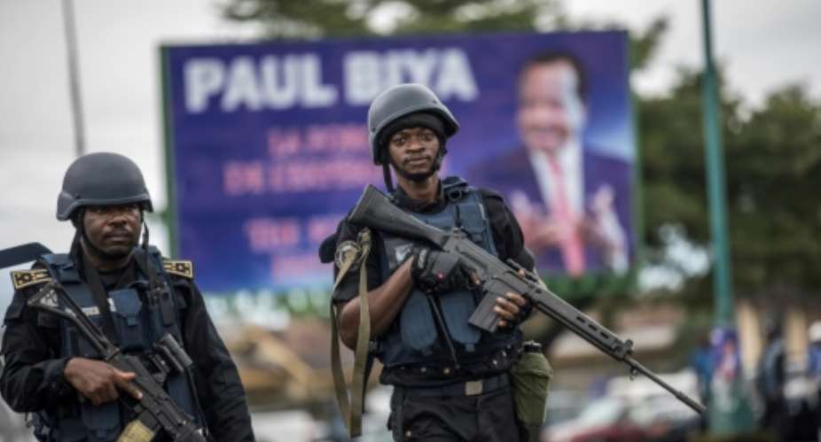 Cameroonian forces on patrol in Buea, capital of Cameroon's majority anglophone South West province..  By MARCO LONGARI AFPFile