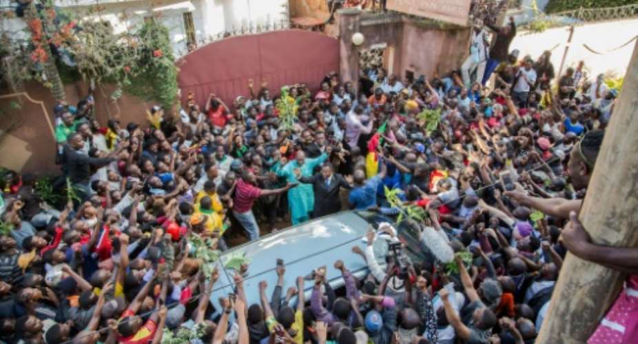 Cameroonian opposition leader Maurice Kamto was greeted and acclaimed by hundreds of supporters.  By STRINGER AFPFile