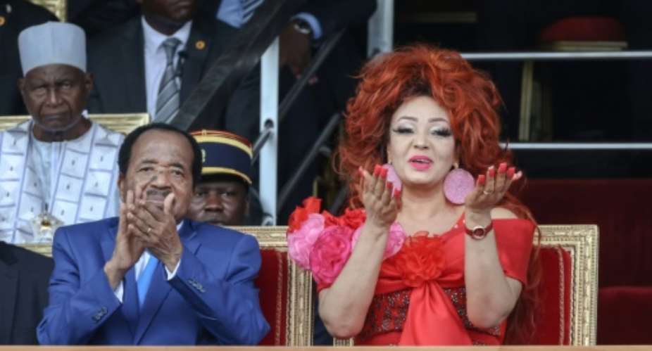 Cameroonian President Paul Biya and wife Chantal, pictured in a May 2024 file photo.  By - (AFP/File)