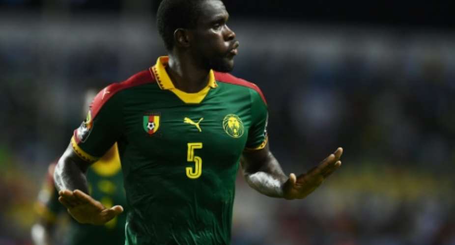 Cameroon's defender Michael Ngadeu-Ngadjui celebrates after scoring a goal on January 18, 2017.  By GABRIEL BOUYS AFP