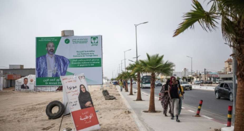 Campaign billboards in Nouakchott ahead of Mauritania's parliamentary elections.  By MED LEMINE RAJEL AFP