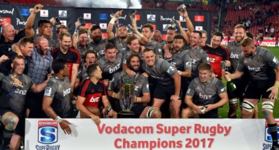 Canterbury Crusaders celebrate their Super Rugby final victory against Golden Lions in Johannesburg last August.  By CHRISTIAAN KOTZE AFP