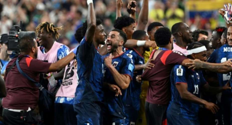Cape Verde players celebrate in Houston.  By RONALDO SCHEMIDT (AFP)