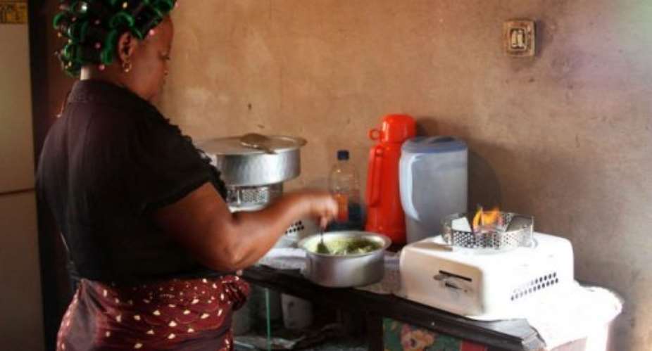 Ethanol-fired stoves burn fuel made from locally grown cassava.  By Jinty Jackson (AFP/File)