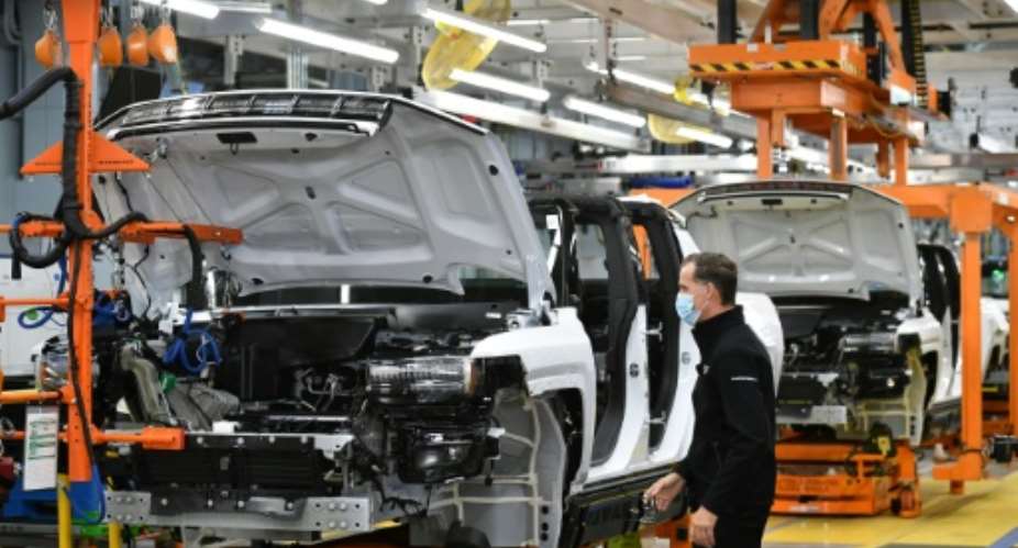 Carmakers epitomised the economic difficulties of 2021 as shortages of computer chips hampered their efforts to recover from a dismal 2020.  By MANDEL NGAN AFPFile