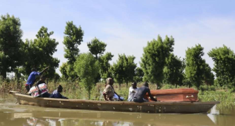Catastrophic floods have cut off road access to many graveyards in N'Djamena. For many mourners, the only way to bury the dead is to take the coffin to the cemetery by canoe.  By Denis Sassou Gueipeur AFP