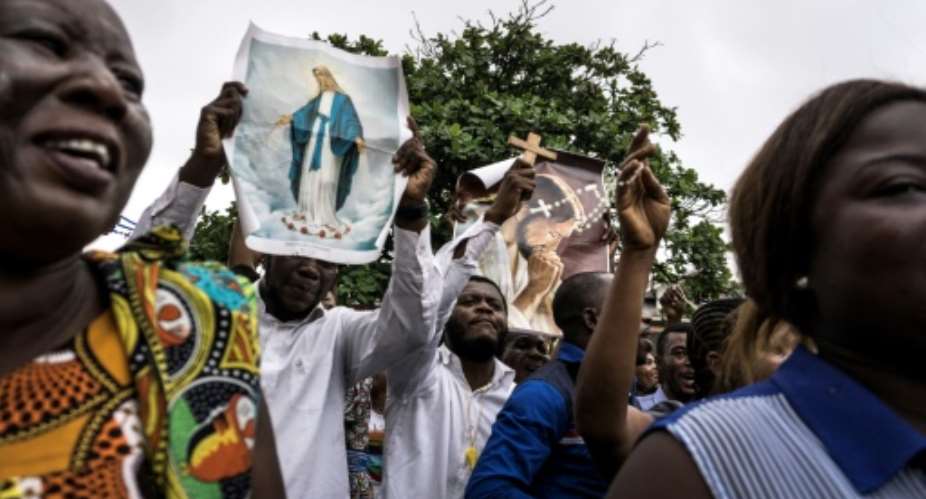 Catholics took part in a demonstration against President Joseph Kabila on December 31 in Kinshasa but it descended into a bloody crackdown by the authorities.  By John WESSELS AFPFile