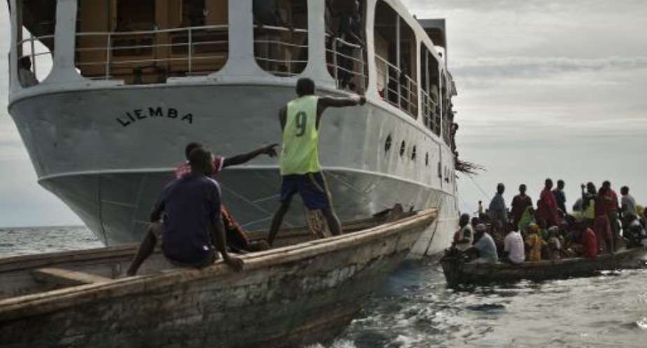 The MV Liemba, a century-old gunship gunship used during the reign of Germany's Kaiser Wilhelm II, is being used to carry Burundian refugees to safety in Tanzania.  By chris oke AFP