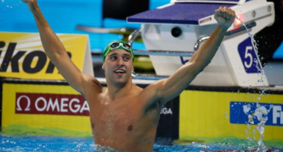 Chad Le Clos of South Africa celebrates after winning the 200m butterfly final on day one of the 13th FINA Short Course Swimming World Championships, at the WFCU Centre in Windsor, Ontario, Canada, on December 6, 2016.  By Gregory Shamus (Getty/AFP)
