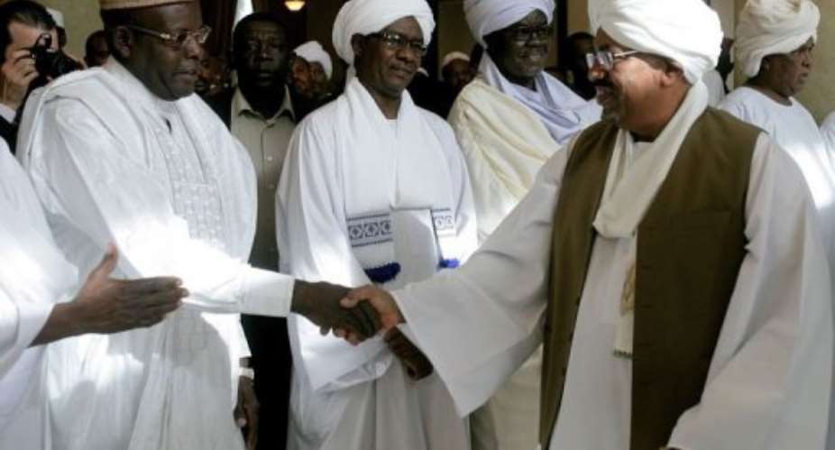 Sudanese President Omar al-Bashir R attends an official ceremony celebrating the marriage.  By Ashraf Shazly AFP