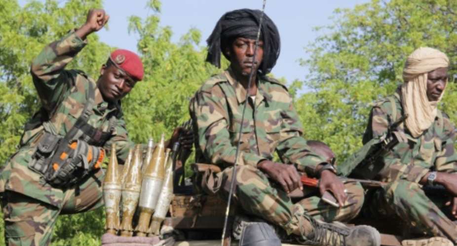 Chadian troops in a regional anti-jihad joint force, pictured on patrol last December.  By AUDU MARTE AFP