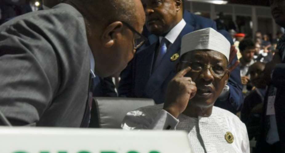 Chad's President Idriss Deby, pictured R July 7, 2019, has said he was lifting social media restrictions imposed more than a year ago for security reasons.  By ISSOUF SANOGO AFP