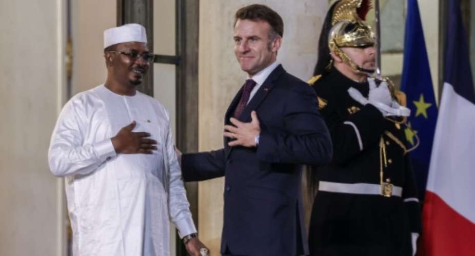 Chads President Mahamat Idriss Deby Itno, left, and French President Emmanuel Macron at the Elysee Palace on Thursday.  By Ludovic MARIN (AFP)