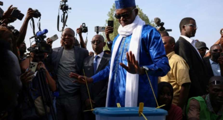 Chad's transitional prime minister and presidential candidate Succes Masra  casting his ballot on Monday  in N'Djamena.  By Joris Bolomey AFPFile