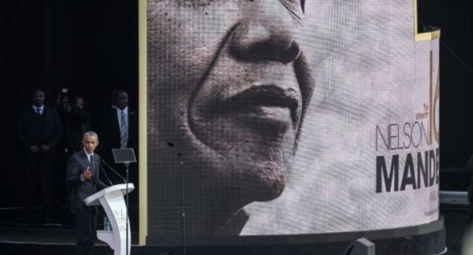 Changing times: Obama warned of the politics of fear and resentment in the annual Nelson Mandela lecture in Johannesburg.  By GIANLUIGI GUERCIA AFP