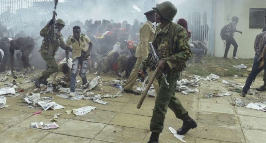Chaos erupted at Kenya's Kasarani stadium in Nairobi as supporters of President Uhuru Kenyatta tried to get into the venue to attend his inauguration ceremony.  By SIMON MAINA AFP
