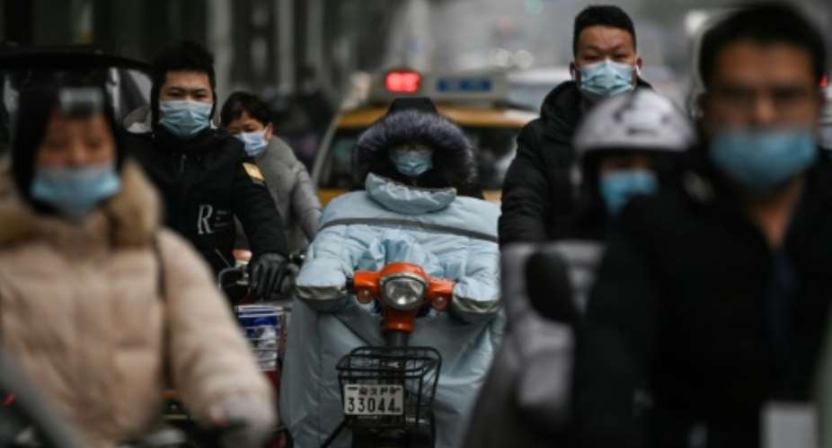 China has sought to deflect blame for the massive global human and economic toll by suggesting -- without proof -- that the virus emerged somewhere else.  By Hector RETAMAL AFP