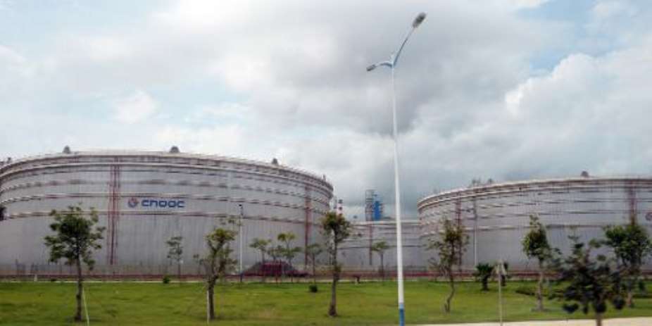 Chinas state-owned CNOOC has secured a $2-billion deal to develop a petroleum field in Uganda and help propel the east African nation into the club of oil-producing countries, an official said.  By Laurent Fievet (AFP)